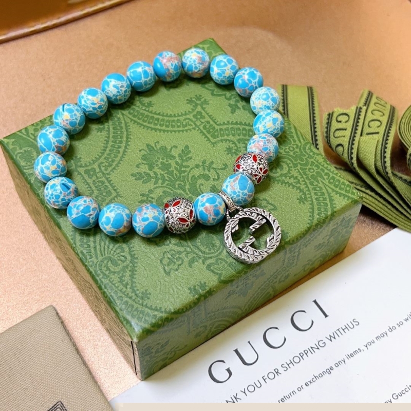 G*u*i bracelets